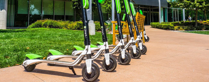 August 9, 2018 Mountain View / CA / USA - Lime Scooters lined up at the LimeHub in the Samsung campus in Silicon Valley, south San Francisco bay area